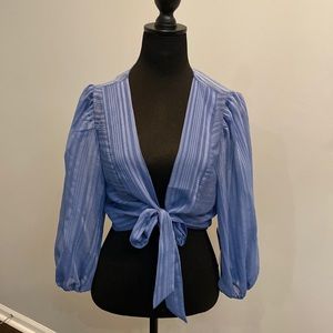 Blue tie front cropped blouse. Brand new w tags. Size Medium